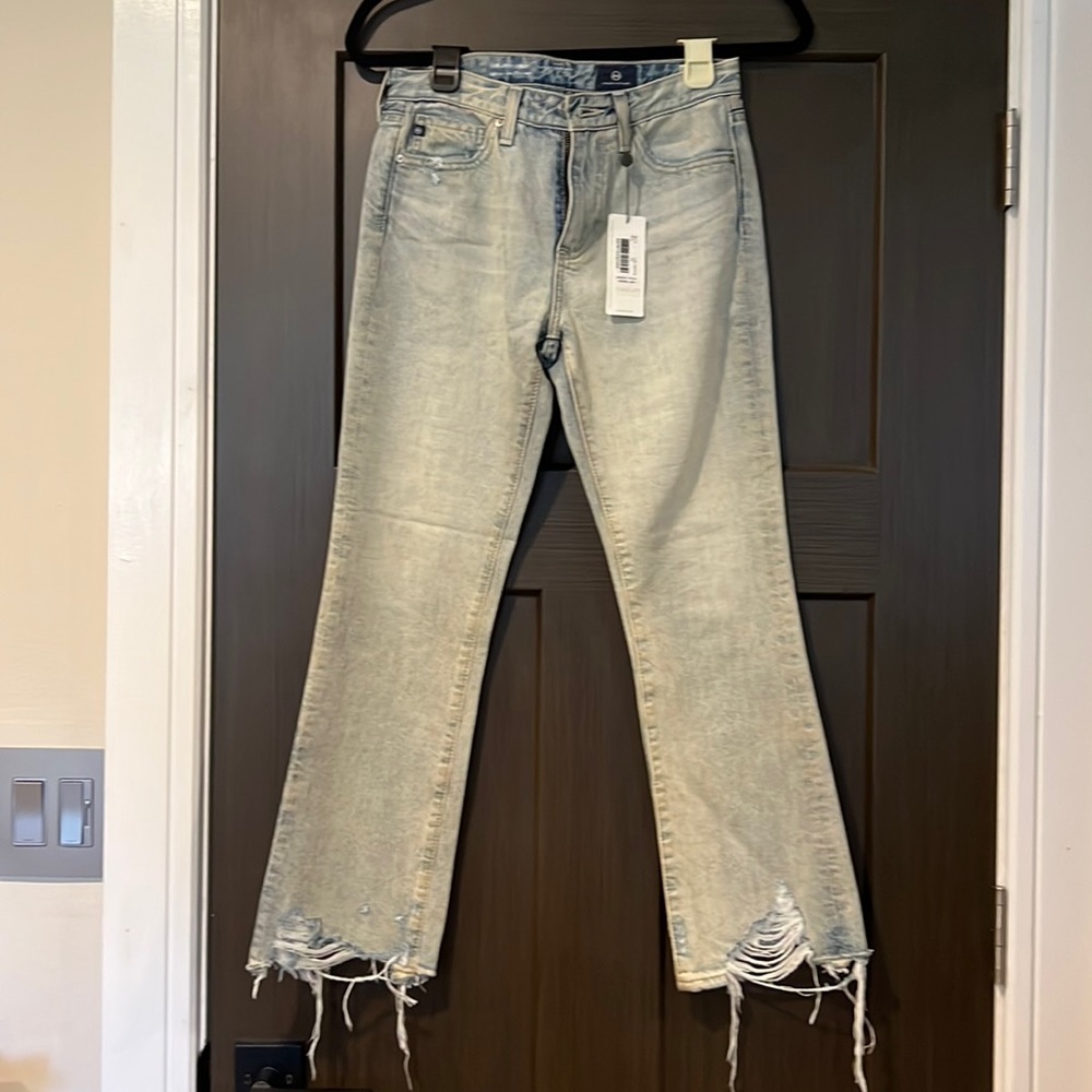 AG flare jeans distressed hem
